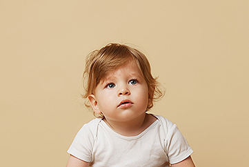 Toddler in white shirt