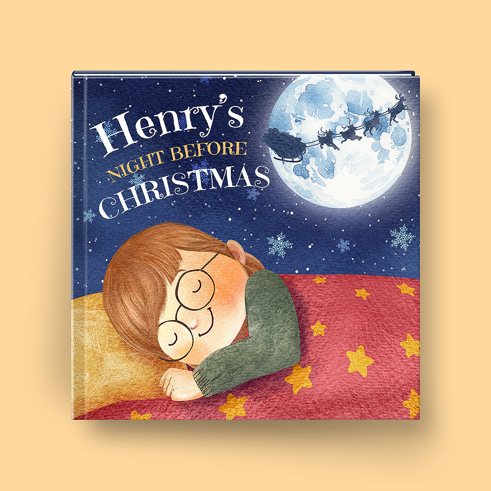 Book cover of 'Henry's Night Before Christmas' with a child sleeping under a starry sky.